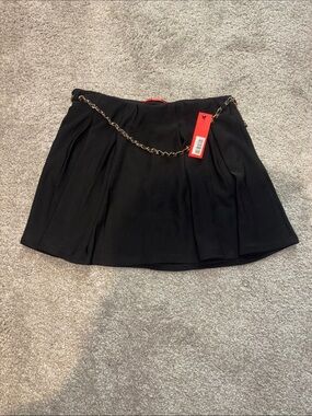 Black Pleated Mini Skirt with Gold Chain Accent